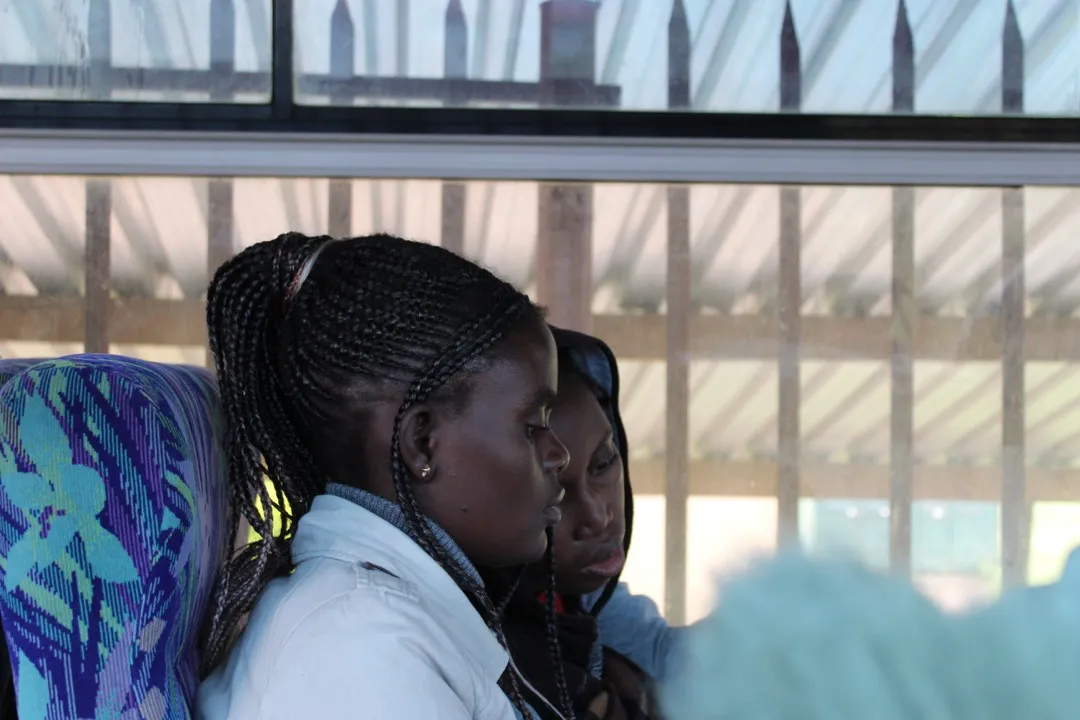 Young women engaged in a mentoring session
